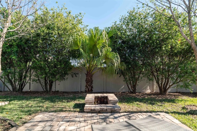 view of patio / terrace featuring fence