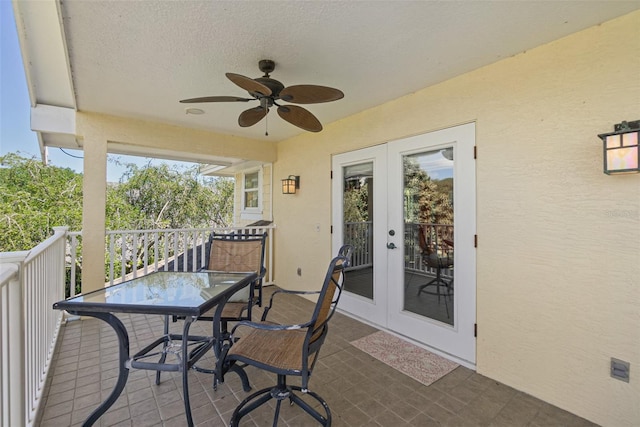 view of patio featuring ceiling fan and french doors