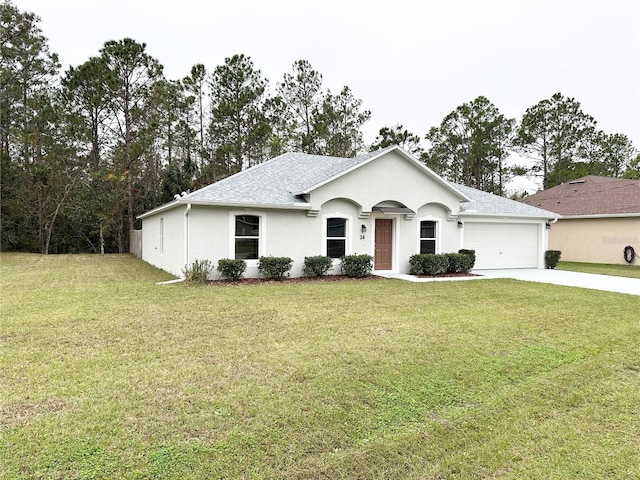 single story home with a front yard and a garage