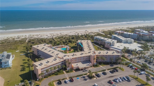 aerial view with a view of the beach and a water view