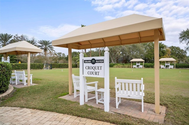 view of community featuring a gazebo and a lawn