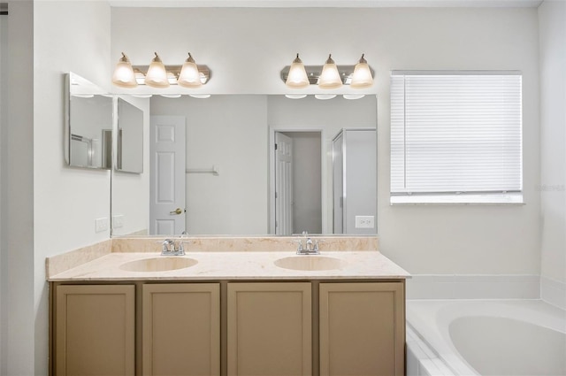 bathroom featuring shower with separate bathtub and vanity