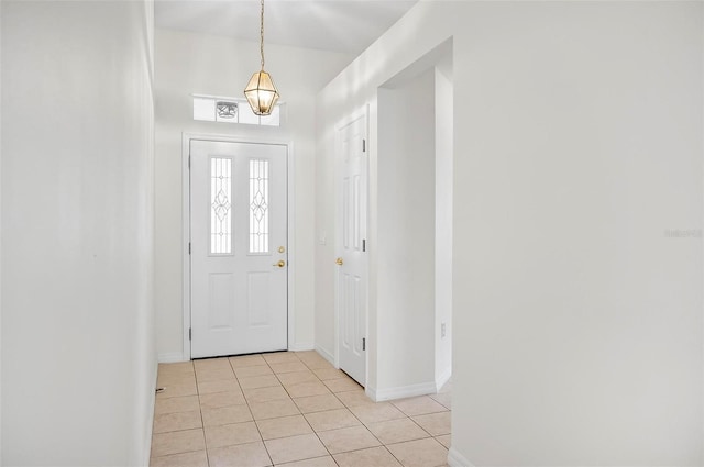 foyer featuring light tile patterned floors