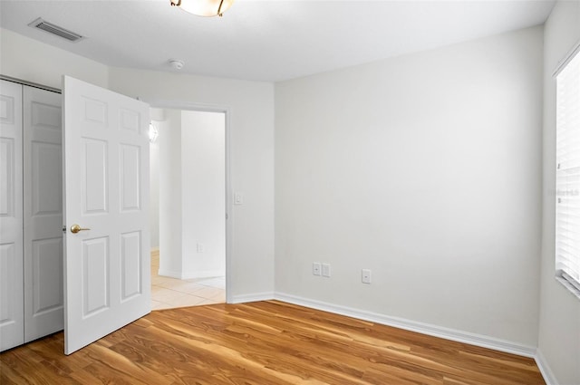 empty room with light wood-type flooring