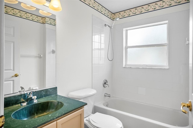 full bathroom featuring vanity, toilet, and shower / tub combination