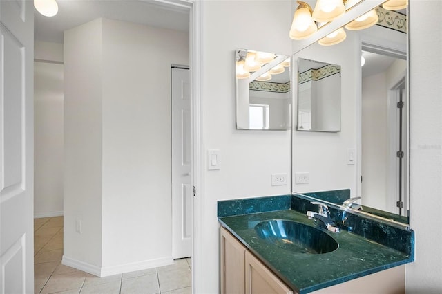 bathroom with vanity and tile patterned floors