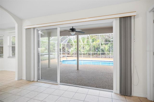 view of swimming pool featuring ceiling fan