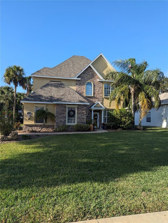 view of front of home featuring a front yard