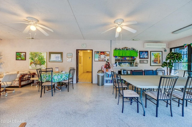 dining space featuring a wall mounted air conditioner, ceiling fan, and a textured ceiling