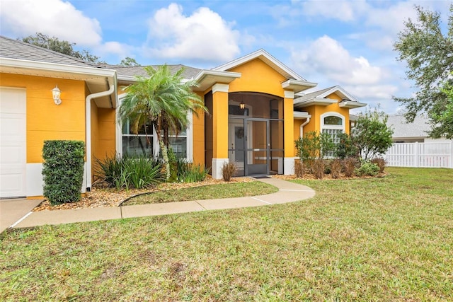 view of front of home with a front lawn