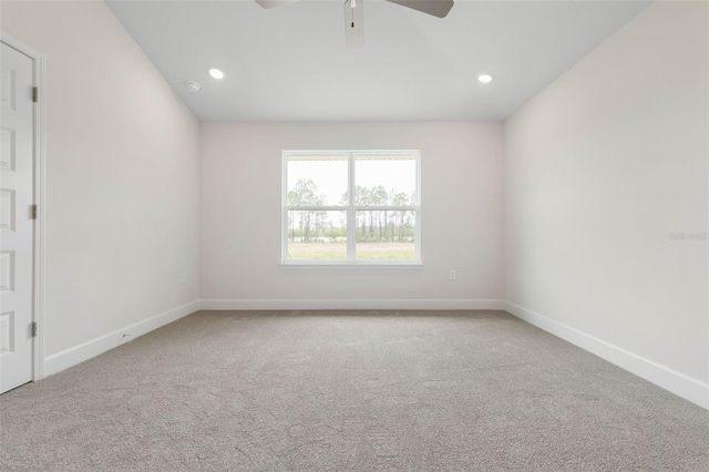 carpeted empty room with recessed lighting, ceiling fan, and baseboards