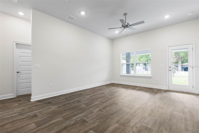 25 Port Echo Ln, Palm Coast, FL 32164 - empty room with dark wood-style flooring, a ceiling fan, and recessed lighting