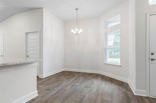 25 Port Echo Ln, Palm Coast, FL 32164 - unfurnished dining area with dark wood-style flooring and a chandelier