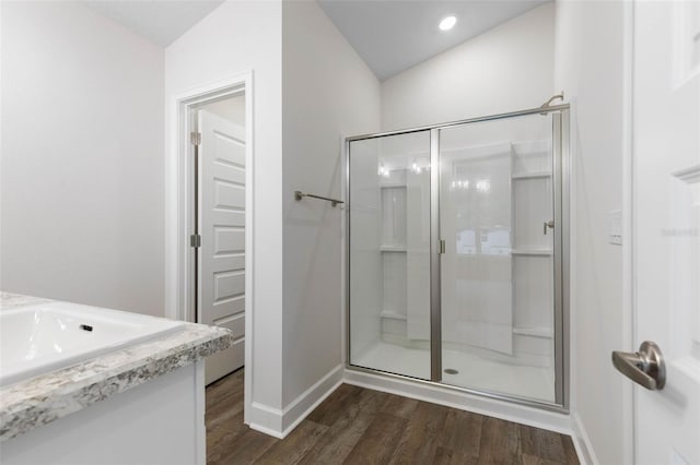 25 Port Echo Ln, Palm Coast, FL 32164 - full bath with a shower stall, wood finished floors, and vanity