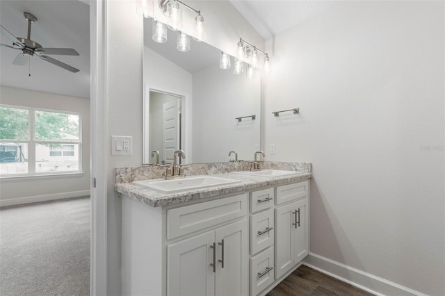 25 Port Echo Ln, Palm Coast, FL 32164 - bathroom with double vanity and a ceiling fan