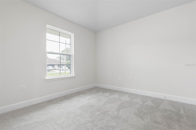 25 Port Echo Ln, Palm Coast, FL 32164 - empty room featuring baseboards and light carpet