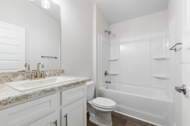 25 Port Echo Ln, Palm Coast, FL 32164 - full bathroom with vanity, shower / bath combination, and wood finished floors