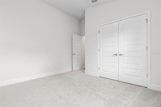 25 Port Echo Ln, Palm Coast, FL 32164 - unfurnished bedroom with carpet flooring and a closet