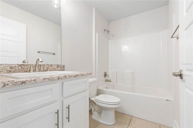 full bathroom featuring vanity, tile patterned floors, bathing tub / shower combination, and toilet