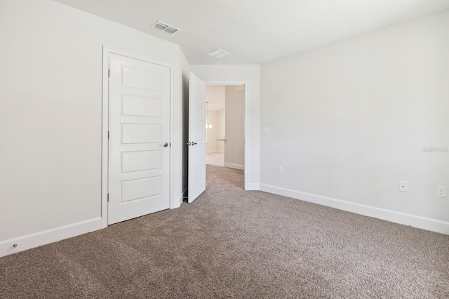 view of carpeted spare room