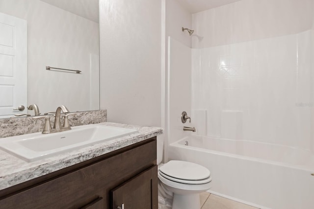 full bathroom with tile patterned flooring, vanity, tub / shower combination, and toilet