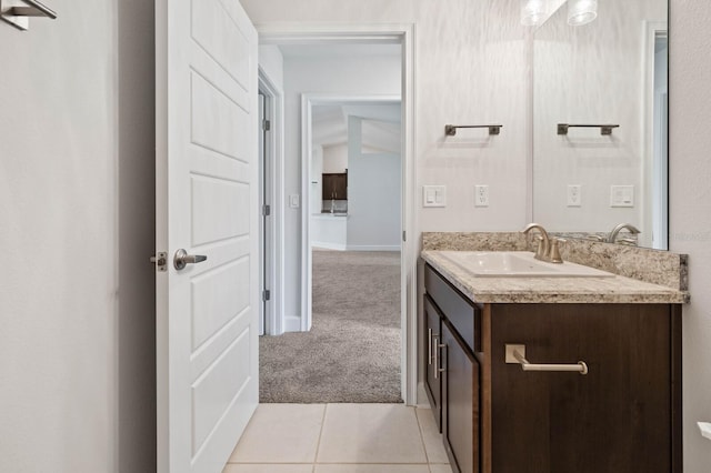 bathroom with tile patterned floors and vanity