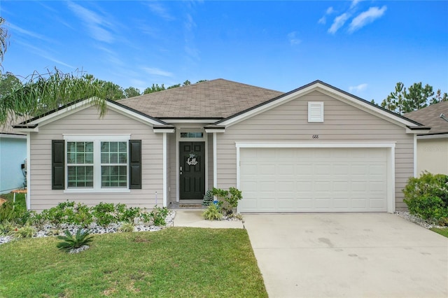 ranch-style home with a front yard and a garage