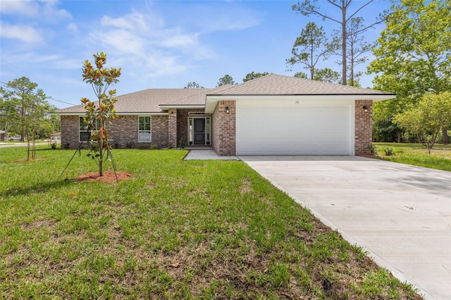 39 Zaun Trl, Palm Coast, FL 32164 - ranch-style house featuring a garage, concrete driveway, a front yard, and brick siding