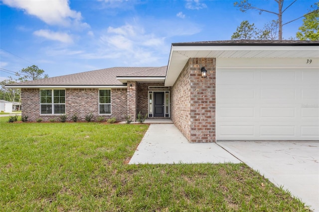 39 Zaun Trl, Palm Coast, FL 32164 - ranch-style home featuring brick siding, a front lawn, a garage, a shingled roof, and concrete driveway