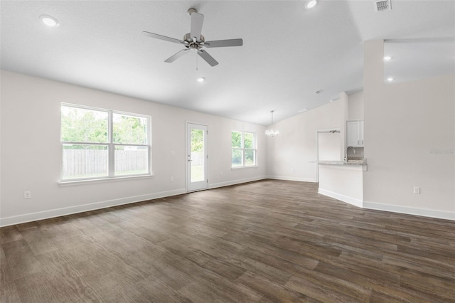 39 Zaun Trl, Palm Coast, FL 32164 - unfurnished living room featuring vaulted ceiling, ceiling fan, baseboards, a sink, and dark wood-type flooring