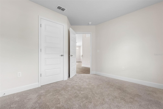 39 Zaun Trl, Palm Coast, FL 32164 - unfurnished bedroom featuring carpet flooring and baseboards