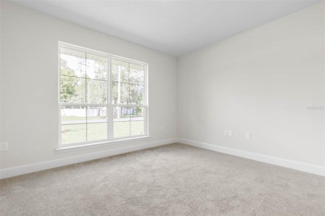 39 Zaun Trl, Palm Coast, FL 32164 - carpeted spare room with baseboards