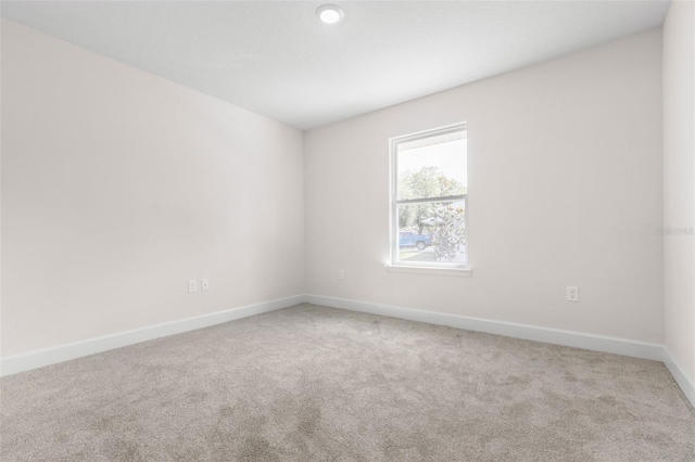 39 Zaun Trl, Palm Coast, FL 32164 - carpeted empty room featuring baseboards