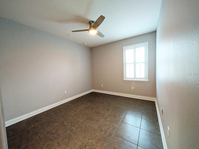 spare room featuring ceiling fan