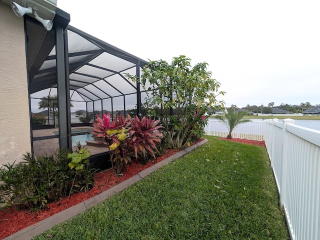 view of yard with a lanai