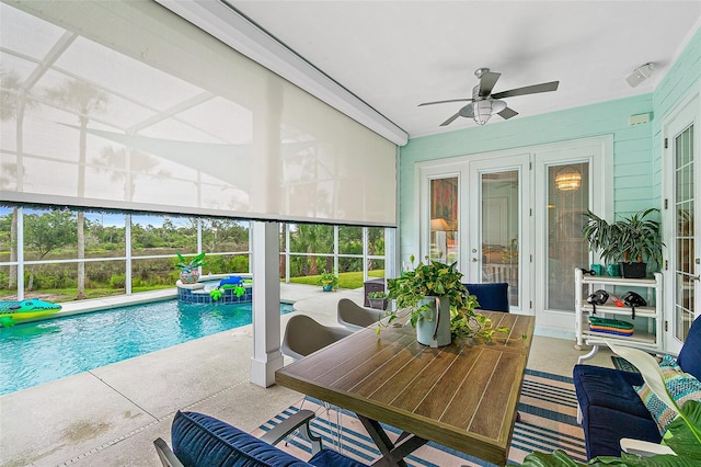 view of pool with ceiling fan