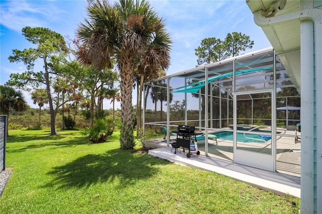 view of yard featuring a lanai and a patio