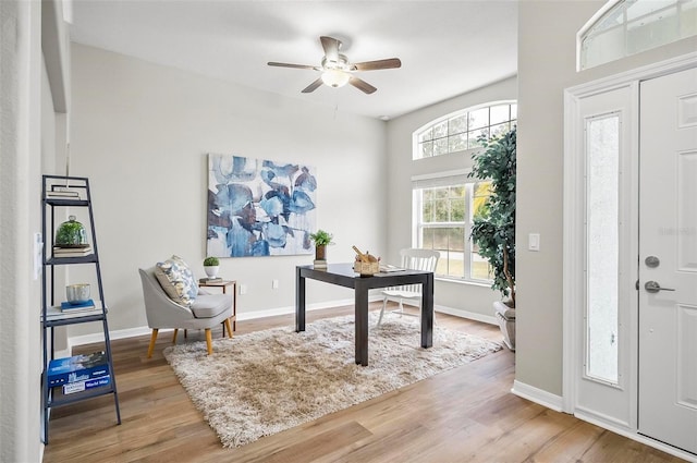 entryway featuring ceiling fan and light hardwood / wood-style floors