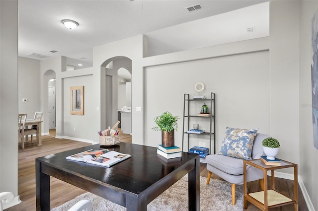 home office featuring wood-type flooring