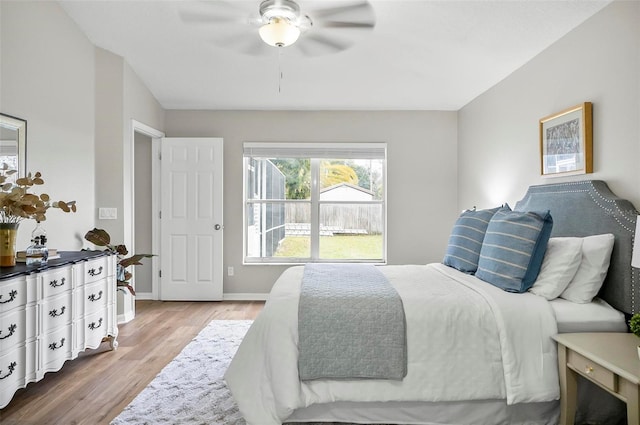 bedroom featuring ceiling fan and light hardwood / wood-style flooring