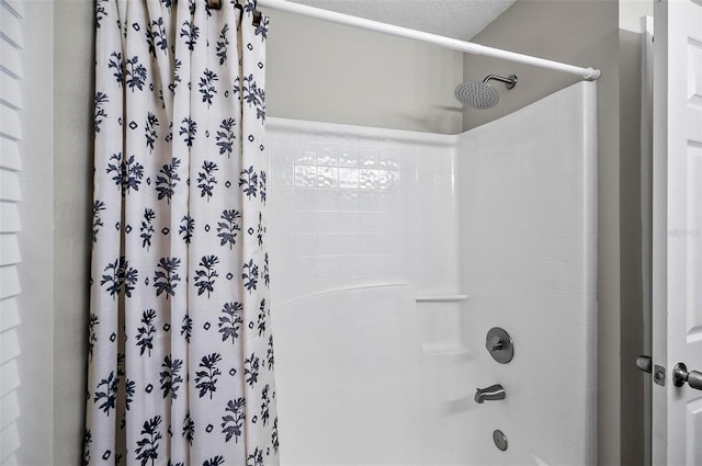 bathroom featuring shower / bath combination with curtain