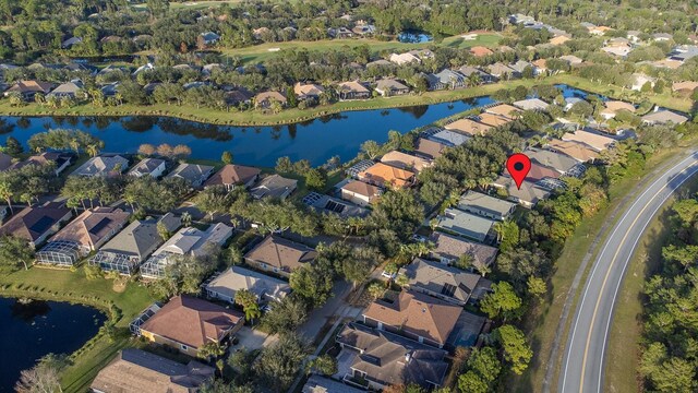 bird's eye view with a water view