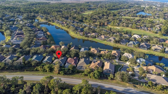 bird's eye view with a water view