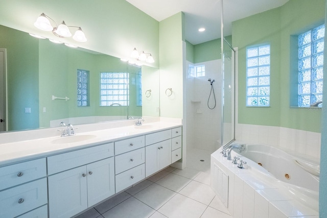 bathroom with vanity, tile patterned floors, and independent shower and bath