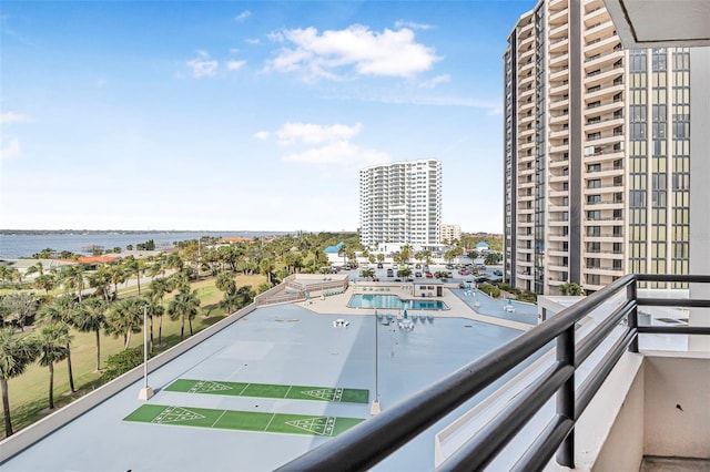 balcony featuring a water view