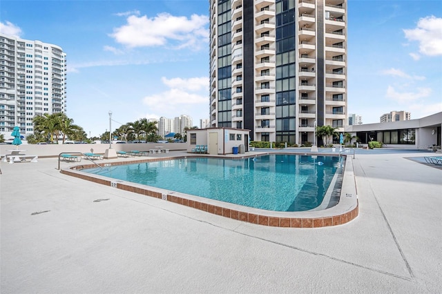 view of swimming pool featuring a patio