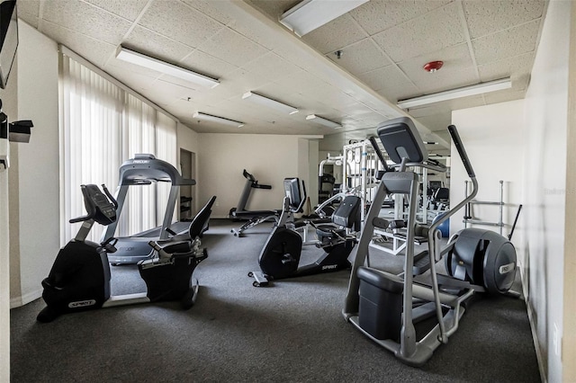 gym featuring a drop ceiling