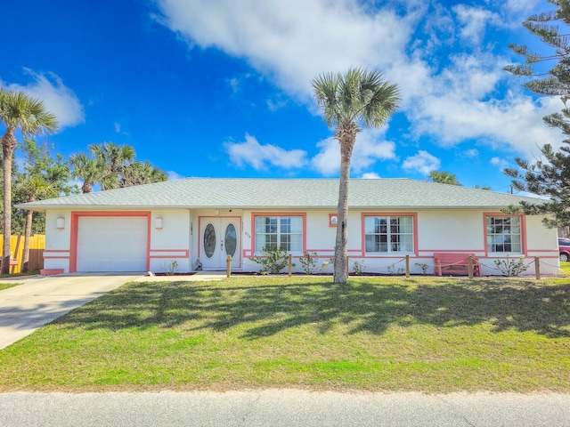 ranch-style house with a garage, concrete driveway, a front yard, and stucco siding