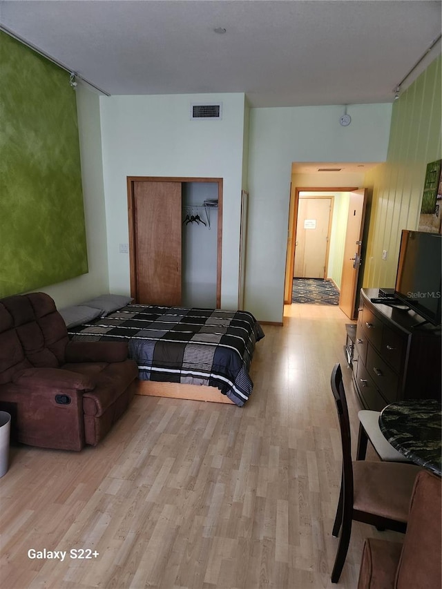 bedroom featuring light hardwood / wood-style floors