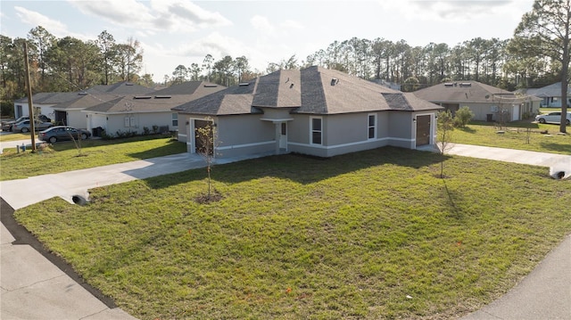 view of front of property with a front lawn